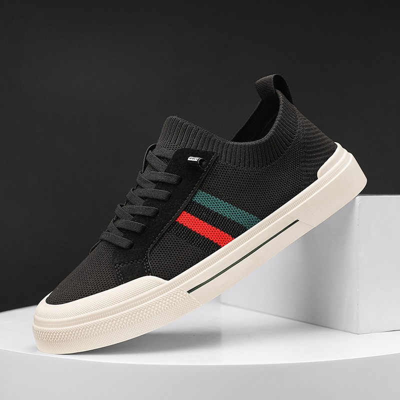 Angled view of men's lightweight, comfortable athletic sneakers, perfect for men's fashion & active footwear.