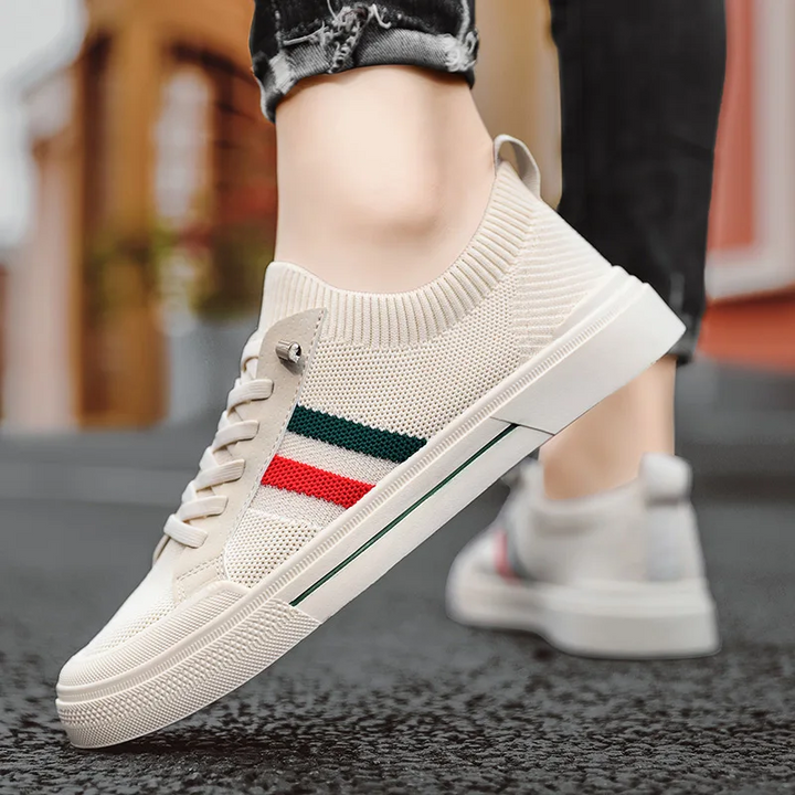 Stylish men's casual sneakers, lightweight & cushioned, perfect for modern street style and daily activities.