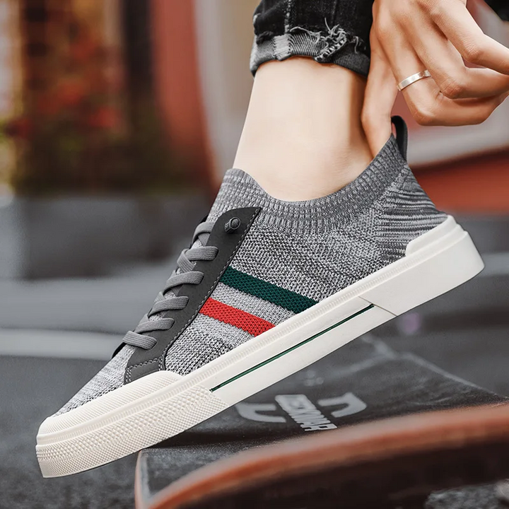 Breathable mesh upper & lace-up design of men's lightweight athletic sneakers for a secure, comfortable fit.