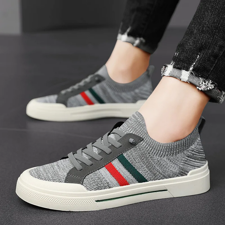Men's lightweight athletic sneakers in motion, offering cushioned comfort for brisk walking or casual wear.