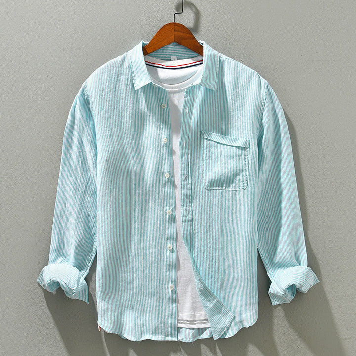 Comfortable men's long-sleeve button-up shirt. Breathable, lightweight fabric for versatile casual daily wear.