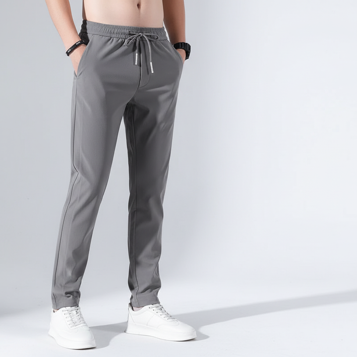 Close-up of quick-dry fabric on men's Stefan jogging trousers, highlighting breathability and texture