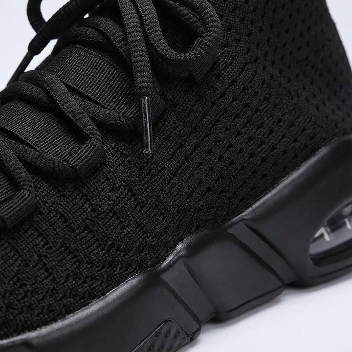 Close-up of the knitted texture on men's lightweight athletic running shoes