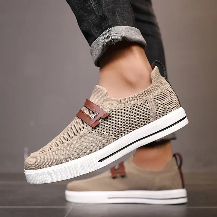 Casual men's slip-on shoes with breathable mesh, offering lightweight comfort for walking & everyday wear.