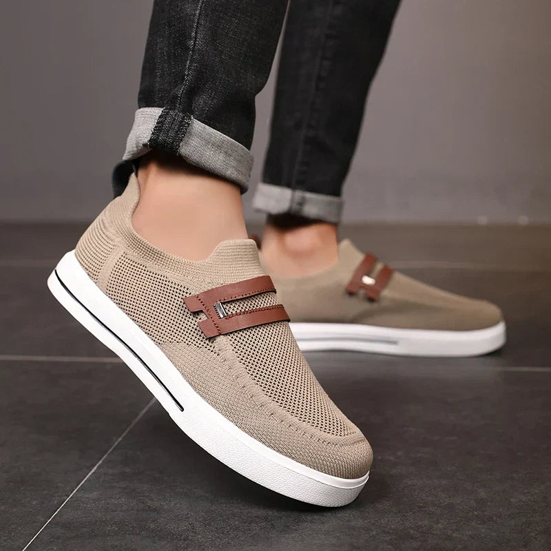 Comfortable men's mesh slip-on shoes, lightweight & breathable, perfect for casual footwear & walking.