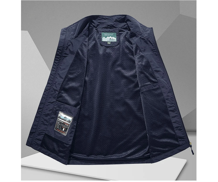 Sleeveless men's mesh vest, quick-dry & breathable, great for outdoor adventures, fishing, travel.
