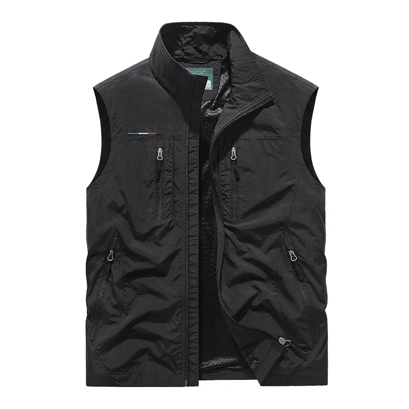 Men's pocketed utility vest with breathable mesh, ideal for fishing, travel, and warm weather layering.
