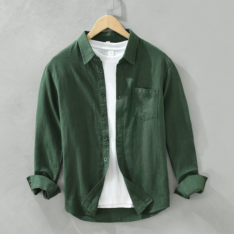 Relaxed fit men's casual button-up shirt. Breathable and lightweight, ideal for summer fashion and vacation.
