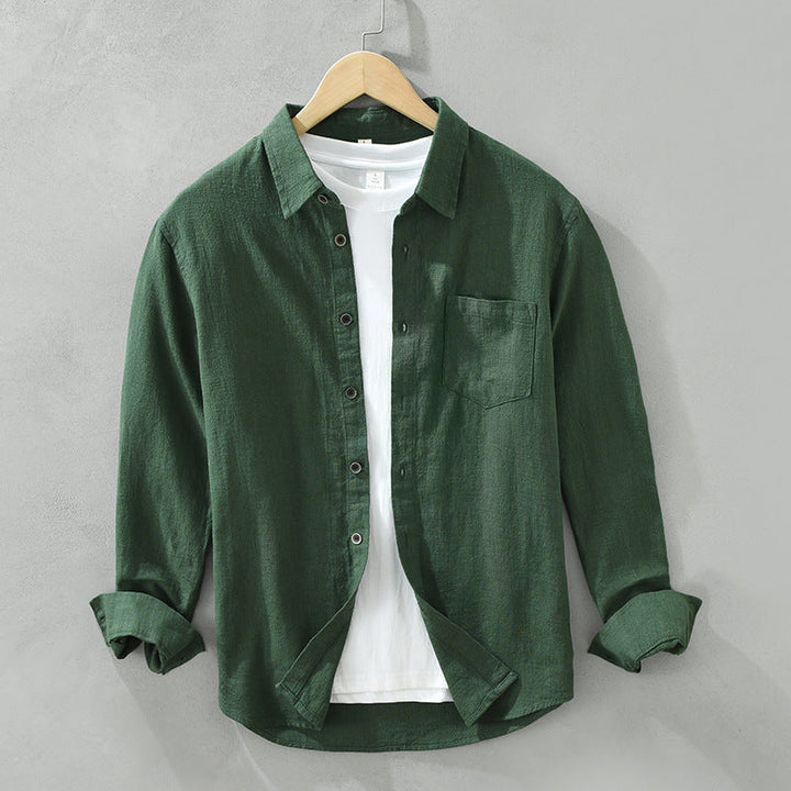 Relaxed fit men's casual button-up shirt. Breathable and lightweight, ideal for summer fashion and vacation.