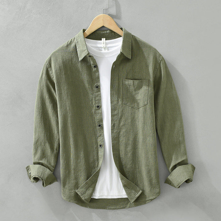 Stylish men's solid color button-up shirt. Short-sleeve, breathable, and lightweight, great for warm weather.
