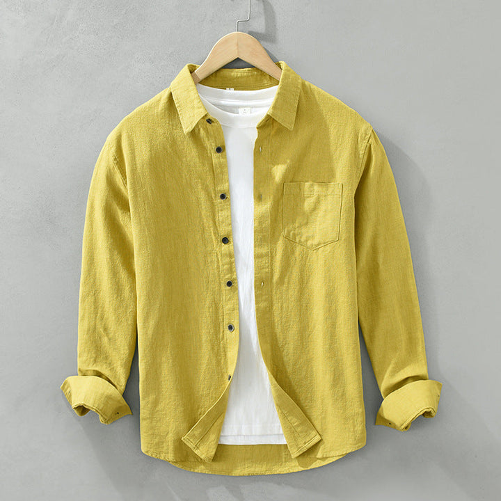Versatile solid color men's button-up shirt. Breathable, lightweight, and comfortable for casual or vacation wear.