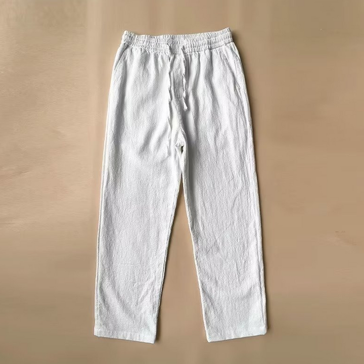 Man enjoying summer in comfortable, lightweight & breathable casual pants. Relaxed fit.