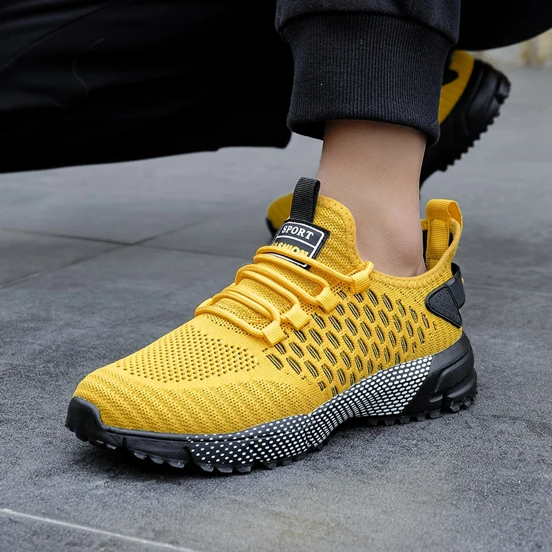 Breathable running shoes for men, lightweight and comfortable for all-surface training.