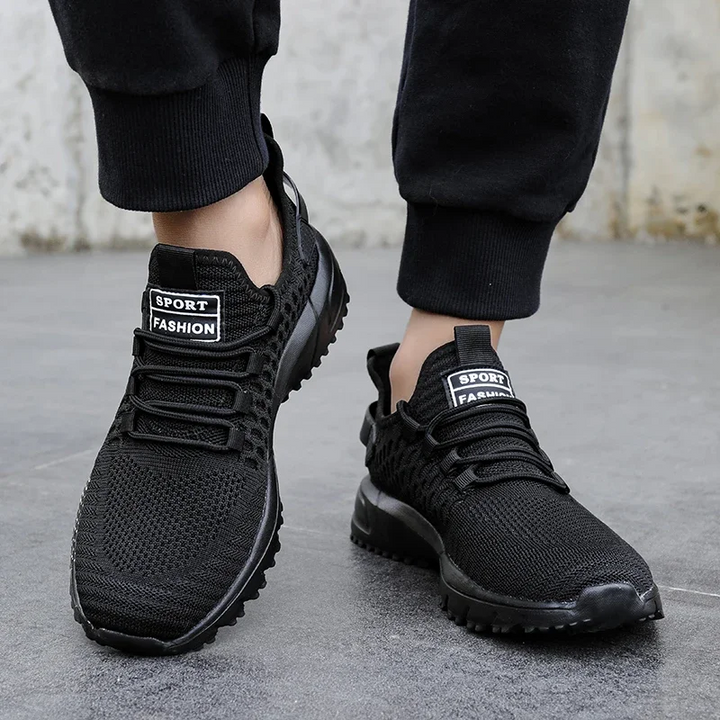 Lightweight men's athletic footwear, breathable design for superior comfort & performance.