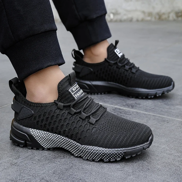 Active men's running trainers, breathable construction for lasting comfort on any surface.