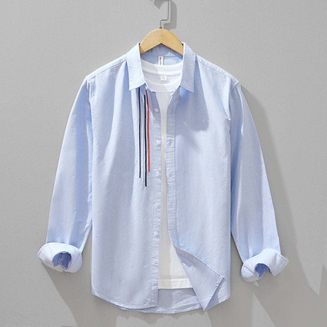 Stylish men's button-up shirt, a versatile casual top for effortless everyday fashion and breathable summer comfort.