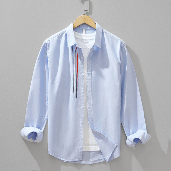 Stylish men's button-up shirt, a versatile casual top for effortless everyday fashion and breathable summer comfort.