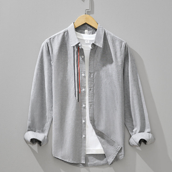 Comfortable men's lightweight shirt, featuring a breathable fabric and classic button-down design for summer fashion.