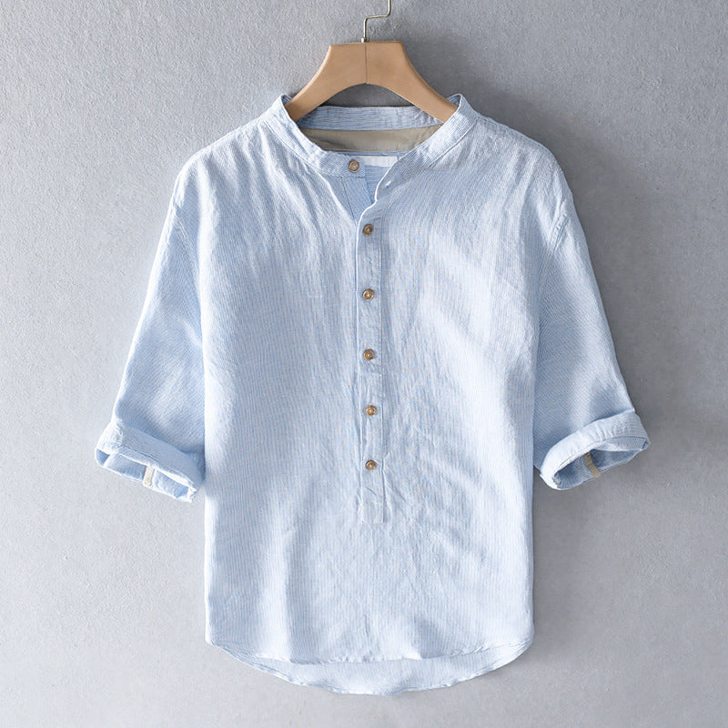 Tailored fit men's lightweight button-down shirt, ideal for summer style & comfortable wear.