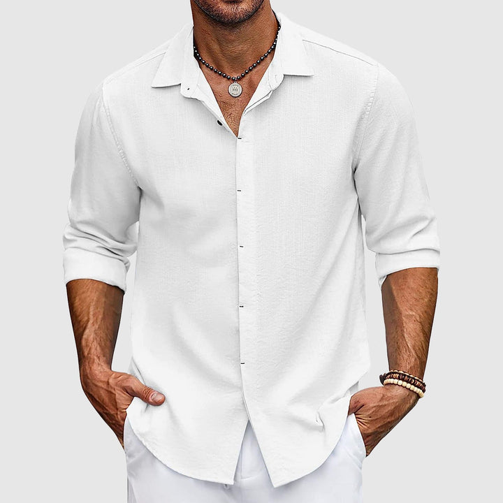 Breathable long-sleeve men's button-up shirt offering all-day comfort for casual or formal occasions.