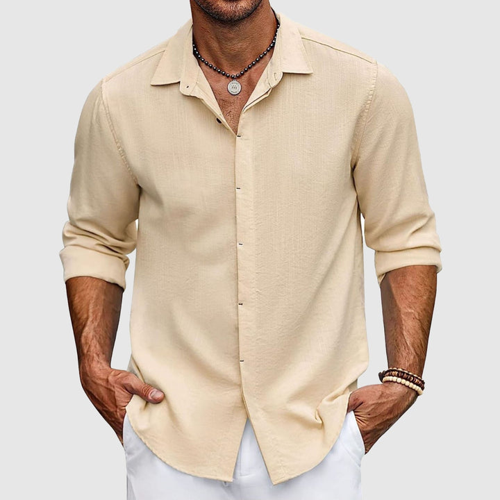 Classic men's button-up shirt, comfortable and breathable, great for layering or stand-alone wear.