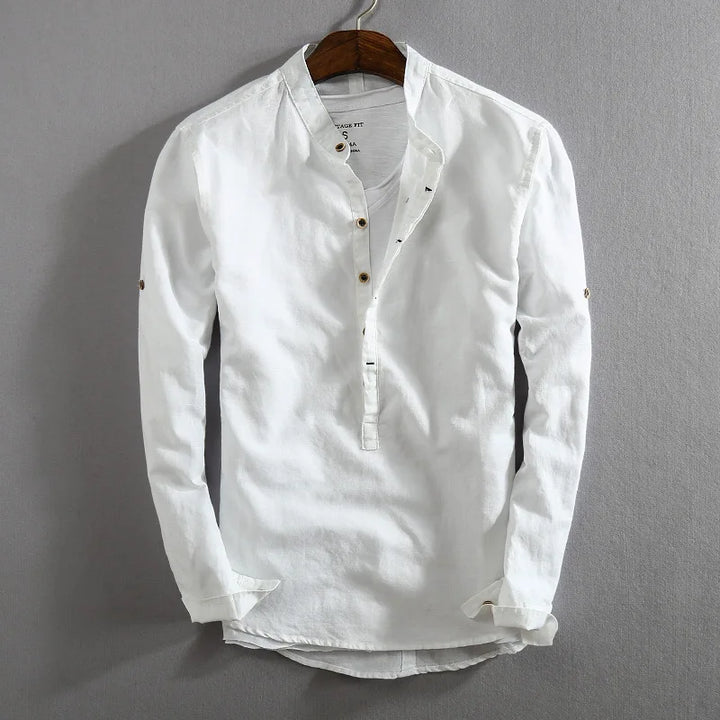 Casual men's long sleeve button-up shirt, lightweight and versatile for effortless everyday fashion. Classic fit.