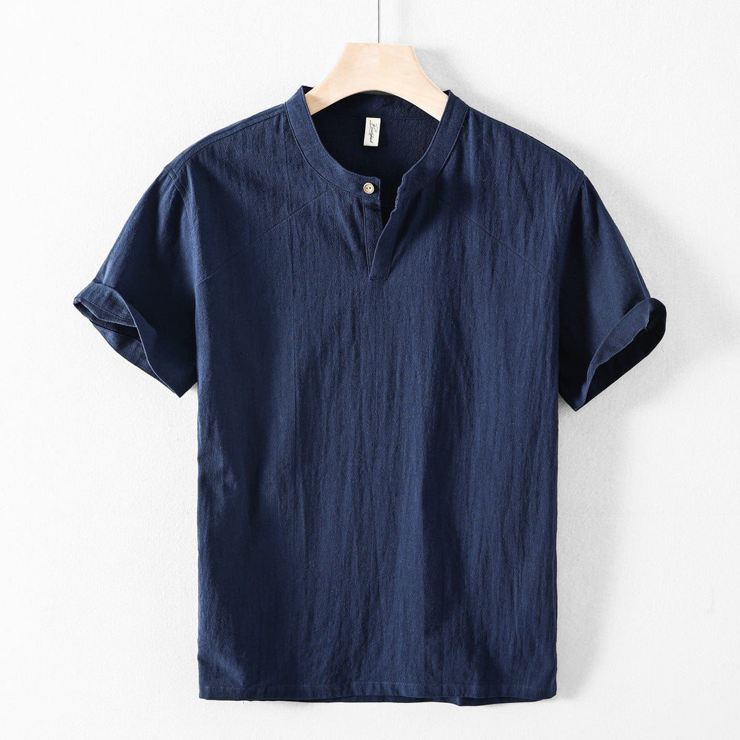 Stylish men's collared lightweight button-down shirt with a relaxed fit, ideal for casual summer outfits.