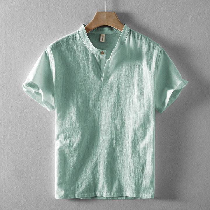 Men's white lightweight casual button-down shirt, long sleeve and relaxed fit, a summer fashion essential.