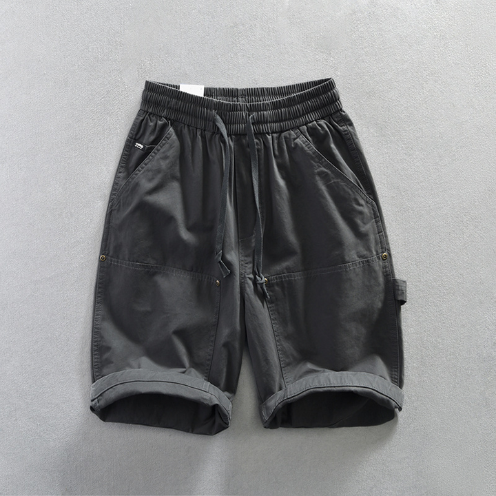 Men's summer comfort shorts with lightweight fabric, elastic waist, drawstring, and patch pockets for casual everyday wear.