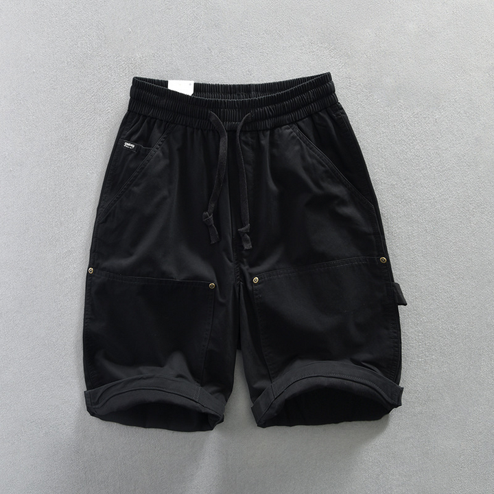 Lightweight men's comfort shorts, perfect for summer. Features an elastic waist, drawstring, and essential patch pockets.