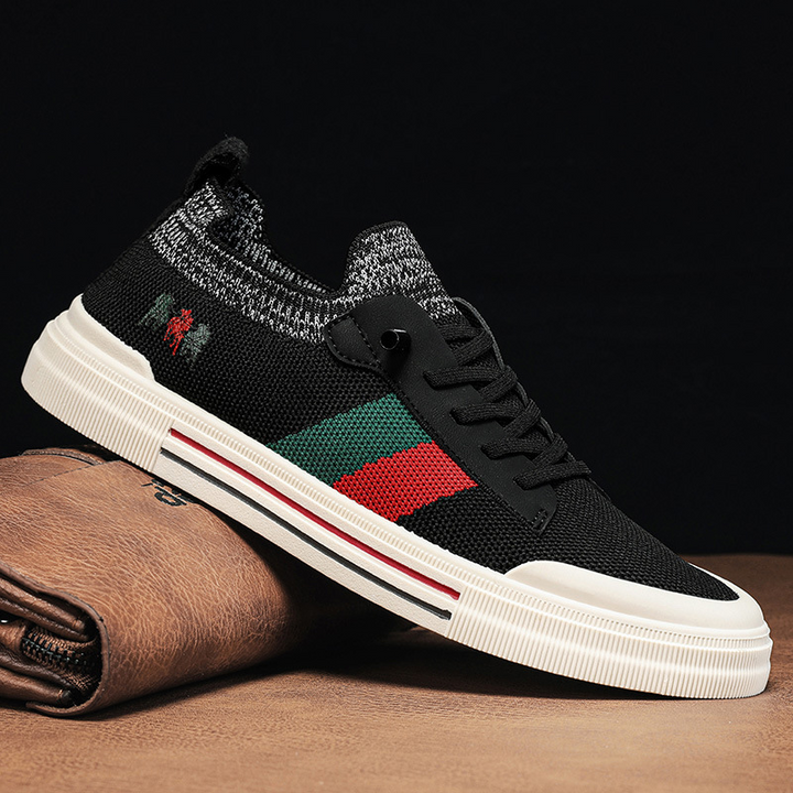 Sleek men's athletic sneakers, combining lightweight construction with superior comfort.