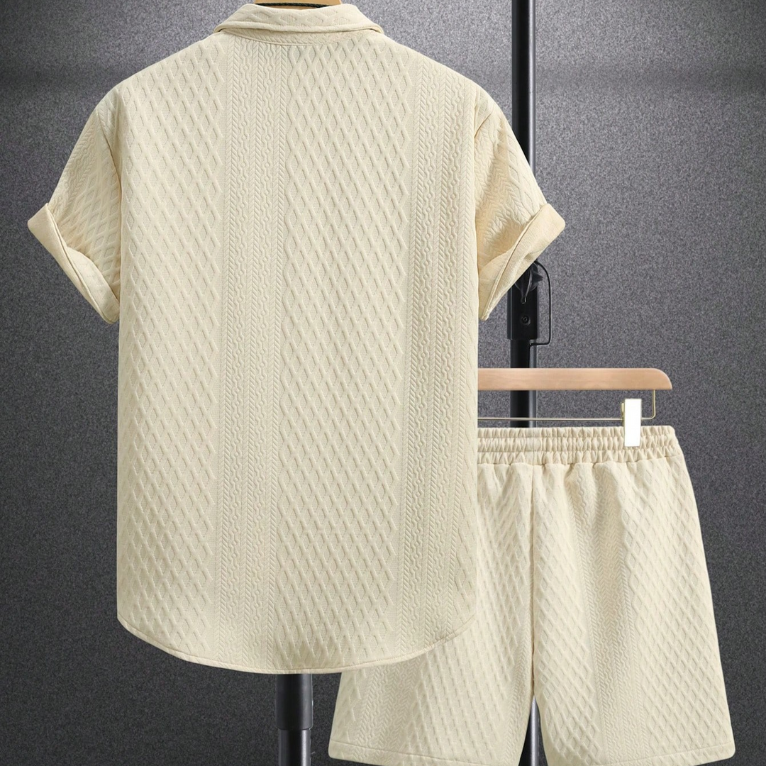 Breathable men's two-piece summer outfit. Lightweight cotton blend shirt & shorts for ultimate vacation comfort.