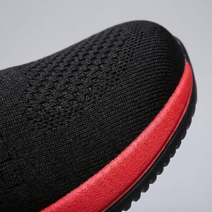 Side view of men's lightweight sneakers, highlighting dynamic sole for ultimate comfort and support