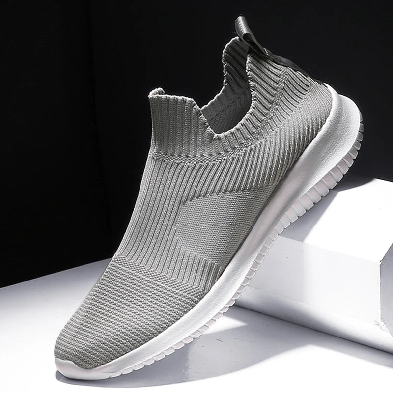 Men's lightweight gray slip-on runners. Comfortable athletic sneakers perfect for everyday walking & casual wear.