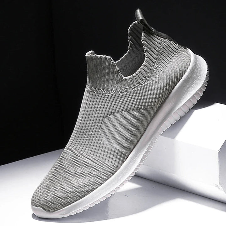 Men's lightweight gray slip-on runners. Comfortable athletic sneakers perfect for everyday walking & casual wear.