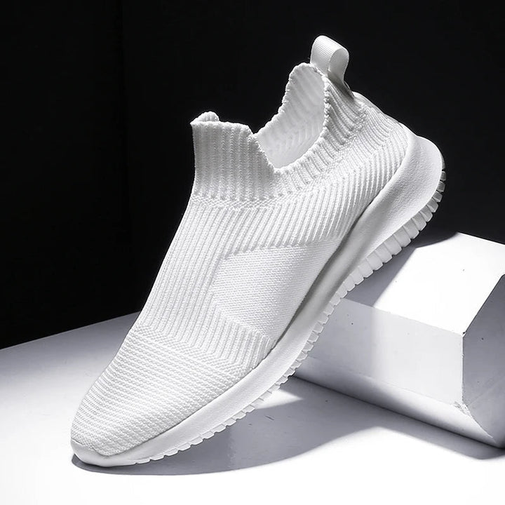 Comfortable men's gray slip-on walking shoes. Lightweight everyday sneakers, perfect for active casual wear.
