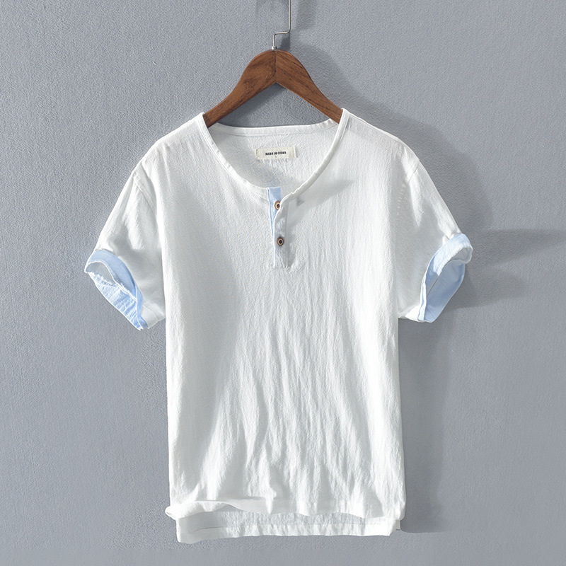 Man wearing a stylish lightweight Henley shirt. A comfortable & relaxed fit casual top for men's summer style.