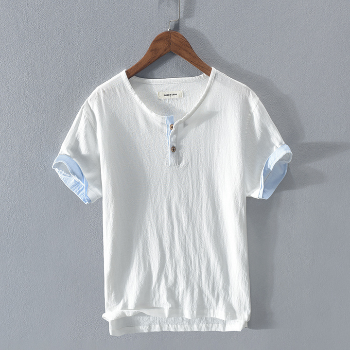 Man wearing a stylish lightweight Henley shirt. A comfortable & relaxed fit casual top for men's summer style.