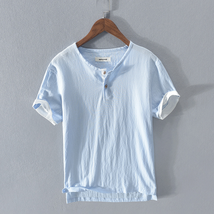 Back view of a men's relaxed fit Henley shirt. A versatile & comfortable casual top for everyday men's fashion.