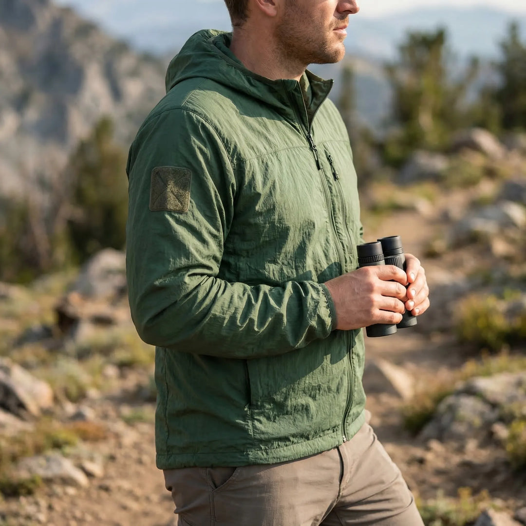 Men's lightweight hooded tactical windbreaker jacket, water-repellent, ideal for outdoor hiking activewear.