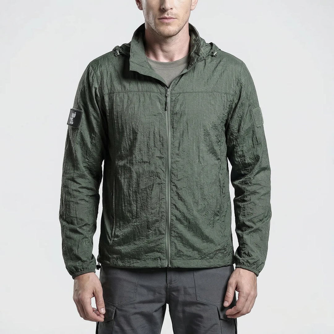 Men's tactical hooded windbreaker for hiking. Lightweight, water-repellent jacket for outdoor activewear.