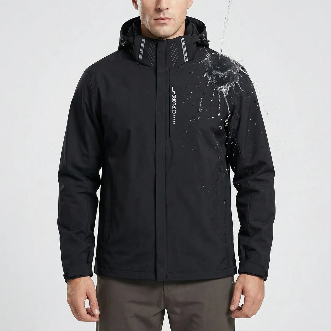 Water-repellent men's softshell windbreaker jacket with hood, ideal for hiking & cool weather.