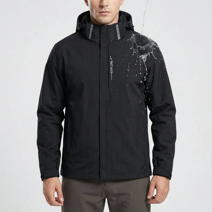 Water-repellent men's softshell windbreaker jacket with hood, ideal for hiking & cool weather.