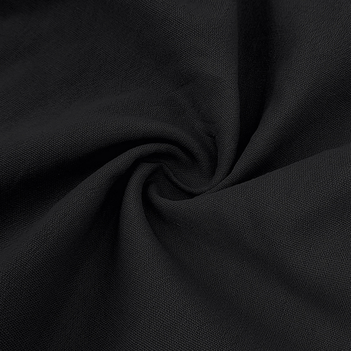 Detail of the collar & buttons on a men's lightweight linen-blend polo shirt. Casual summer style.