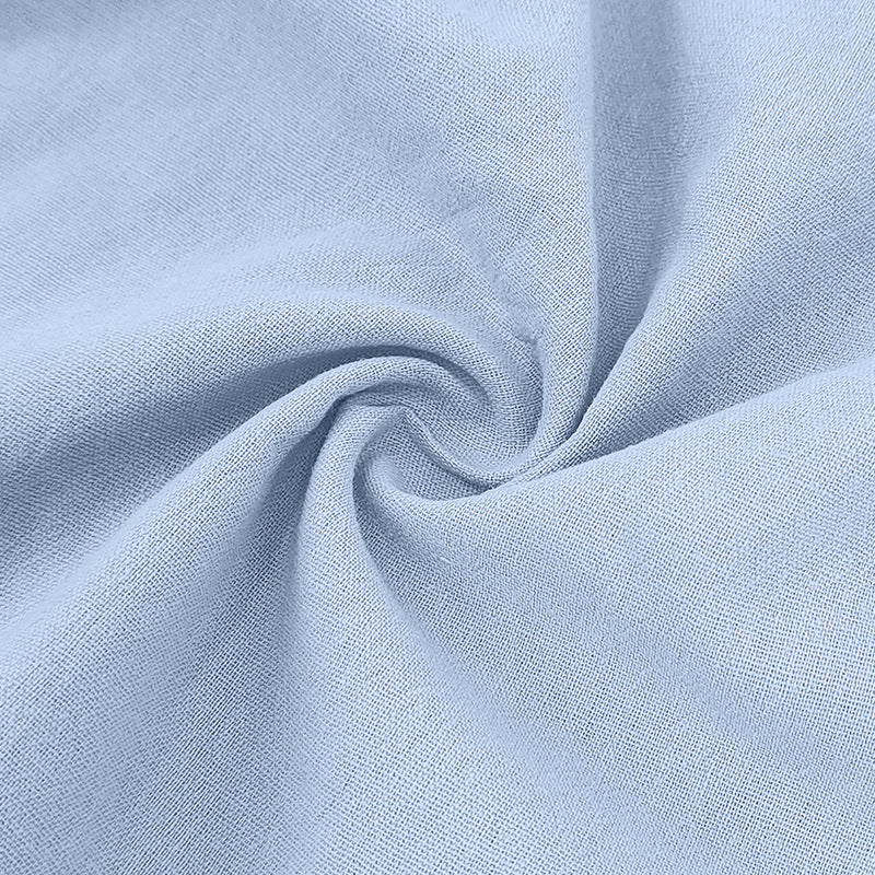 Folded men's linen-blend polo set. Breathable two-piece shorts & shirt for travel or lounge wear.