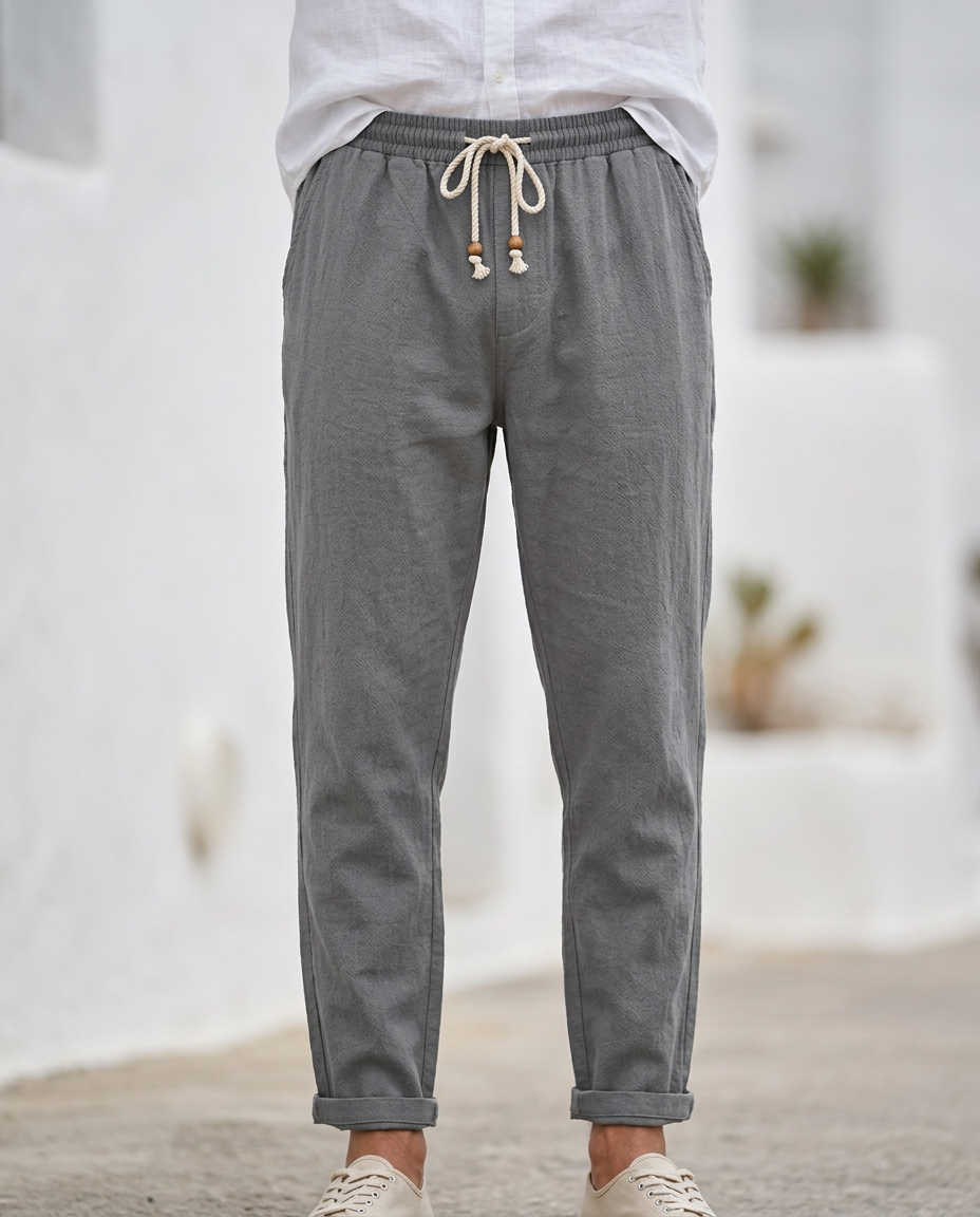 Soft men's linen drawstring trousers. Breathable, relaxed fit, perfect for warm weather comfort.