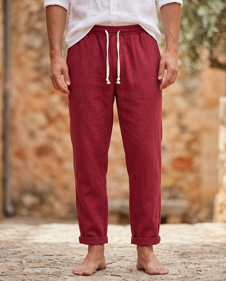 Versatile men's linen drawstring trousers. Lightweight, relaxed fit, great for summer casual outfits.