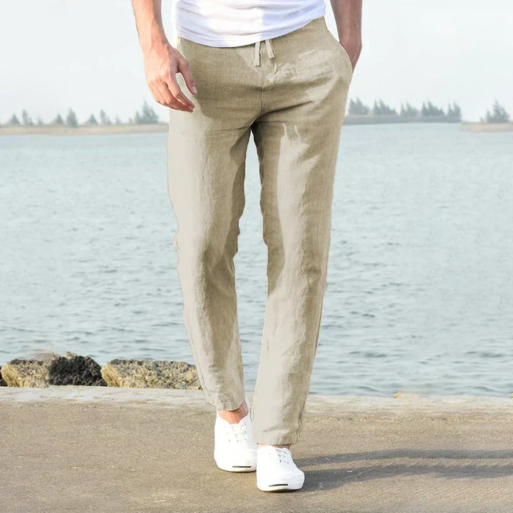 Breathable men's linen summer pants for beachwear, vacations, or relaxed casual outfits in warm weather.