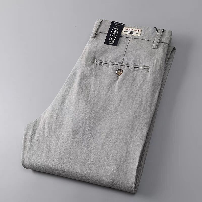 Men's lightweight linen trousers in a natural color, perfect for summer comfort and smart casual style.