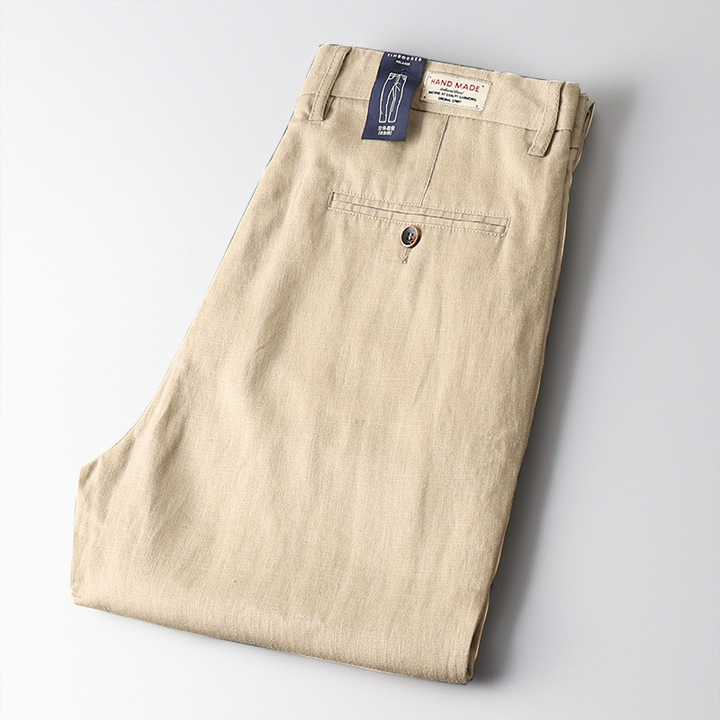 Stylish men's lightweight linen trousers, perfect for summer. Tapered fit ensures breathable comfort & smart casual look.